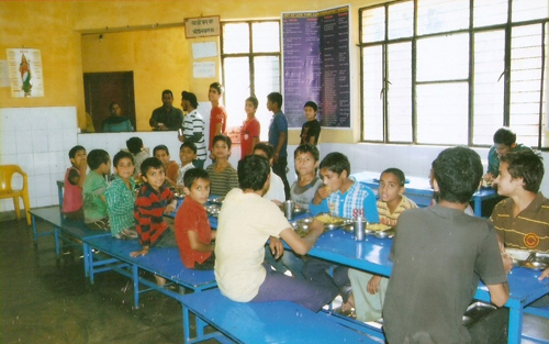 Inmates taking Meals in Boys Mess.